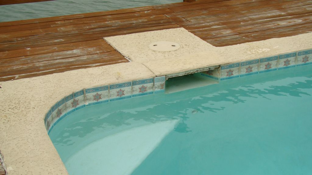 EXISTING WOOD DECK, CONCRETE STEPS and FLATWORK, HANDRAILS, BULKHEAD, STAIRS and POOL to be REPLACED
